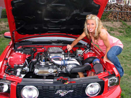 Hot Blonde Babe Maintaining a Mustang